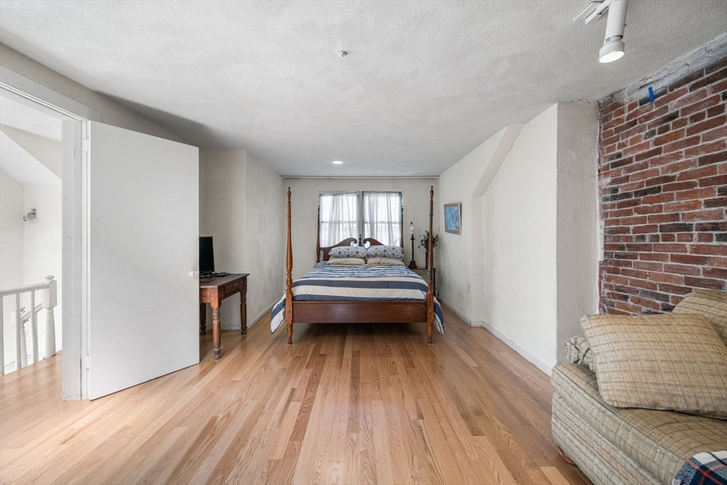 50 East Springfield Street, Unit 1 Boston, MA 02118 - Photo 17 of 23 a view of a room with furniture and wooden floor