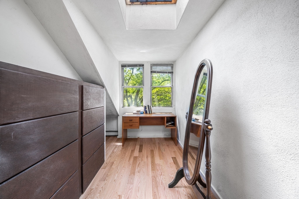 50 East Springfield Street, Unit 1 Boston, MA 02118 - Photo 18 of 23 a view of a room with wooden floor and furniture