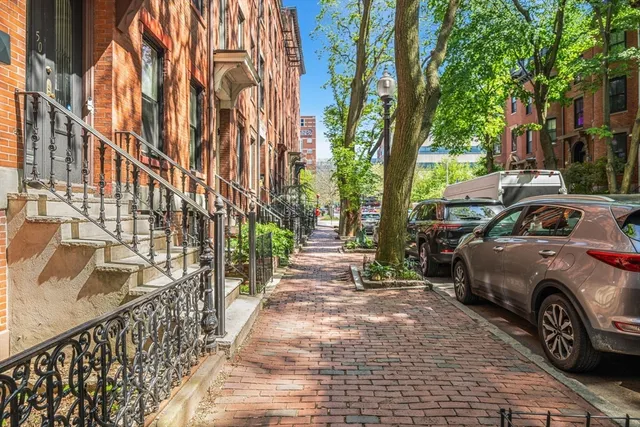 a view of a car park in front of a building