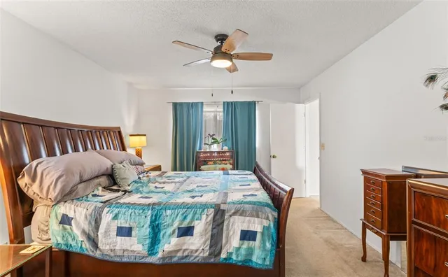 a bathroom with a sink mirror vanity and toilet