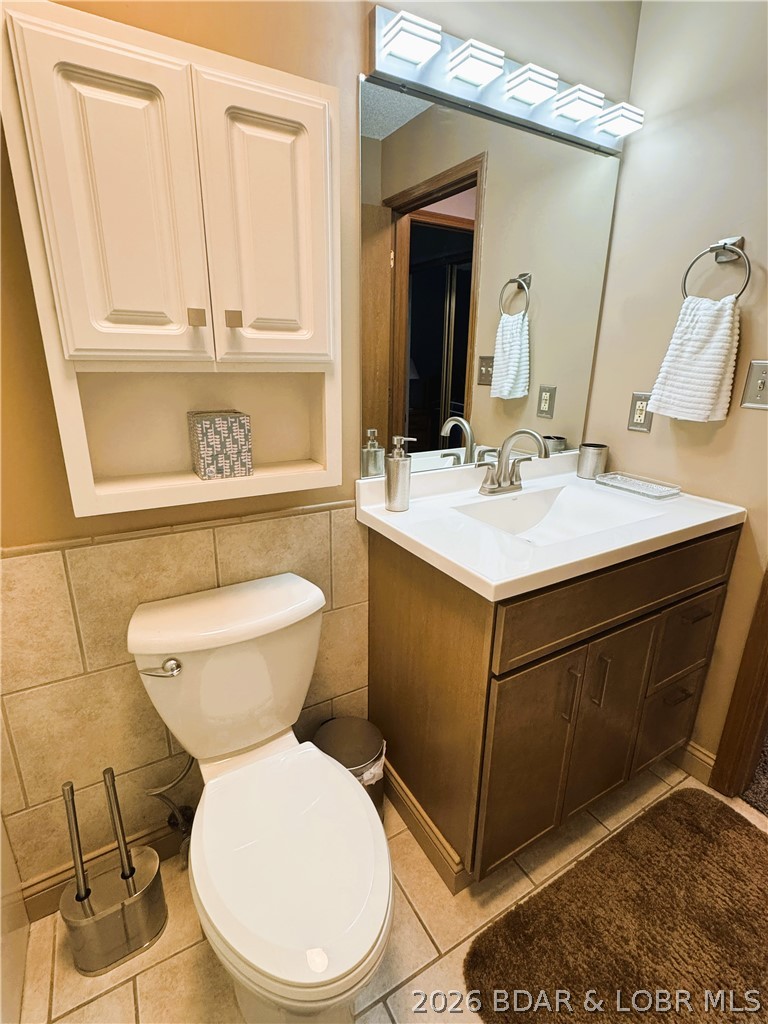 1442 Nichols Road, Unit D301 Osage Beach, MO 65065 - Photo 12 of 42 NEW Shower Door, Vanity & Lighting