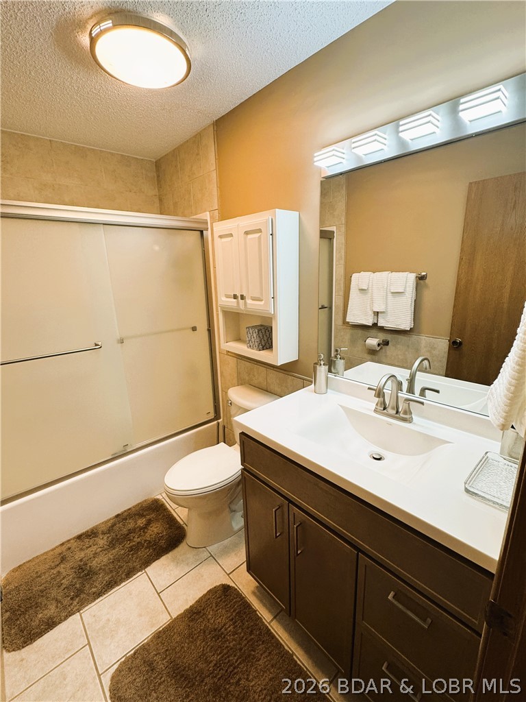1442 Nichols Road, Unit D301 Osage Beach, MO 65065 - Photo 9 of 42 NEW Shower Door, Vanity & Lighting