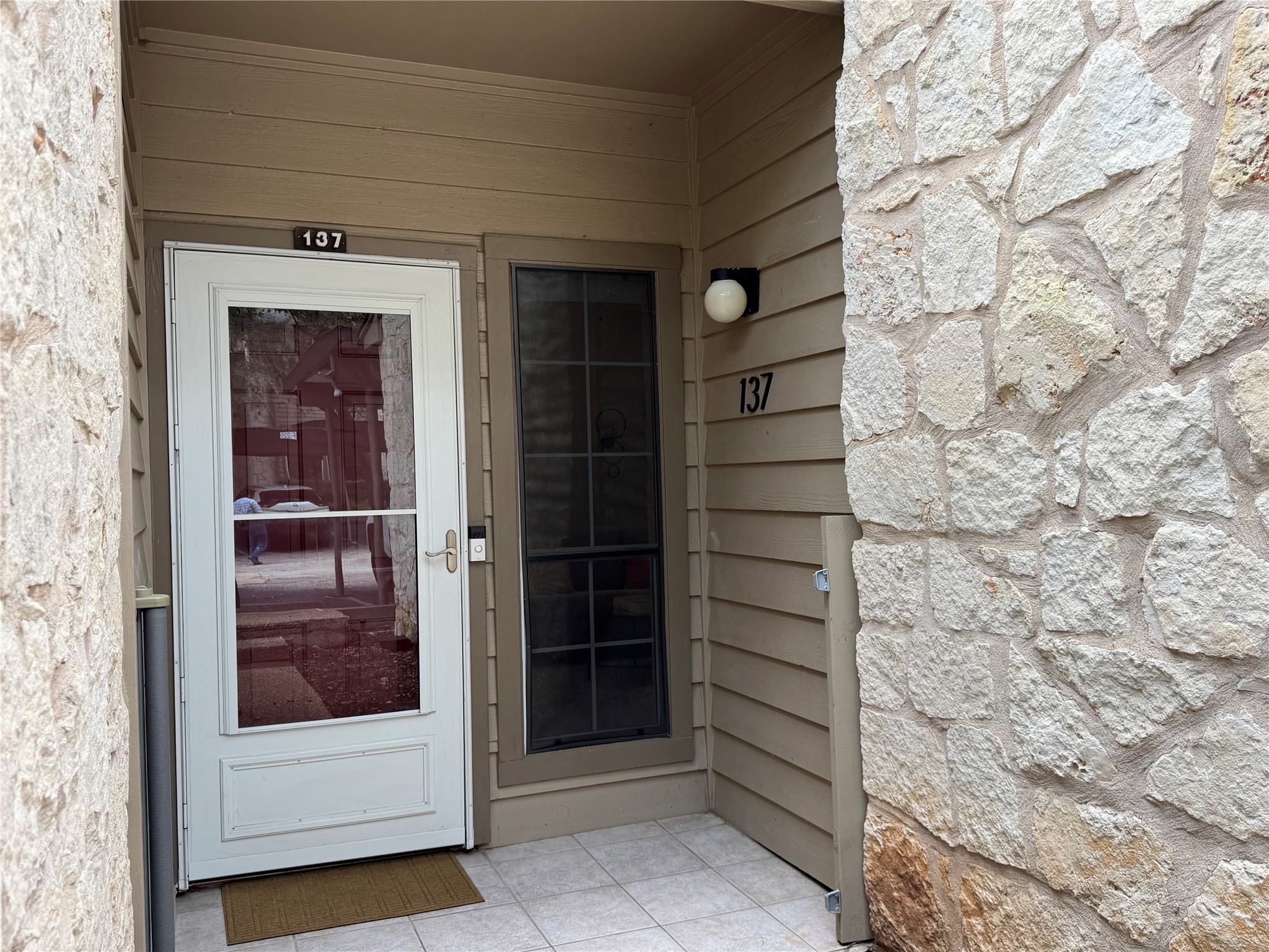 3809 Spicewood Springs Road, Unit 137 Austin, TX 78759 - Photo 28 of 34 Tiled front entry!