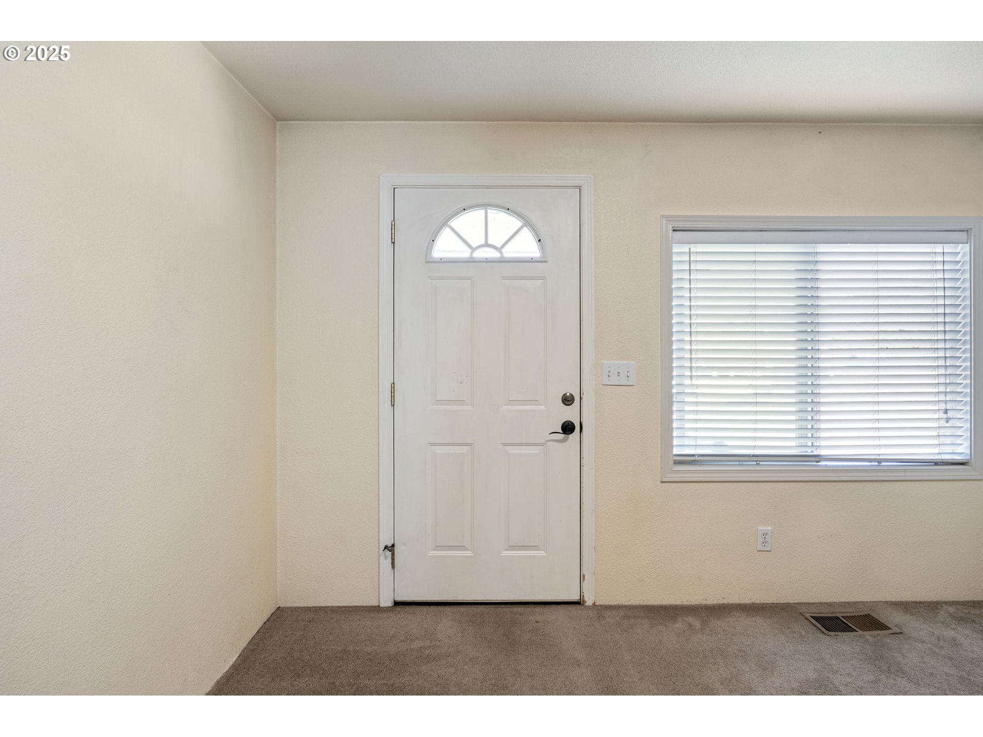 405 Lane Avenue Drain, OR 97435 - Photo 16 of 47 a view of an empty room with a window