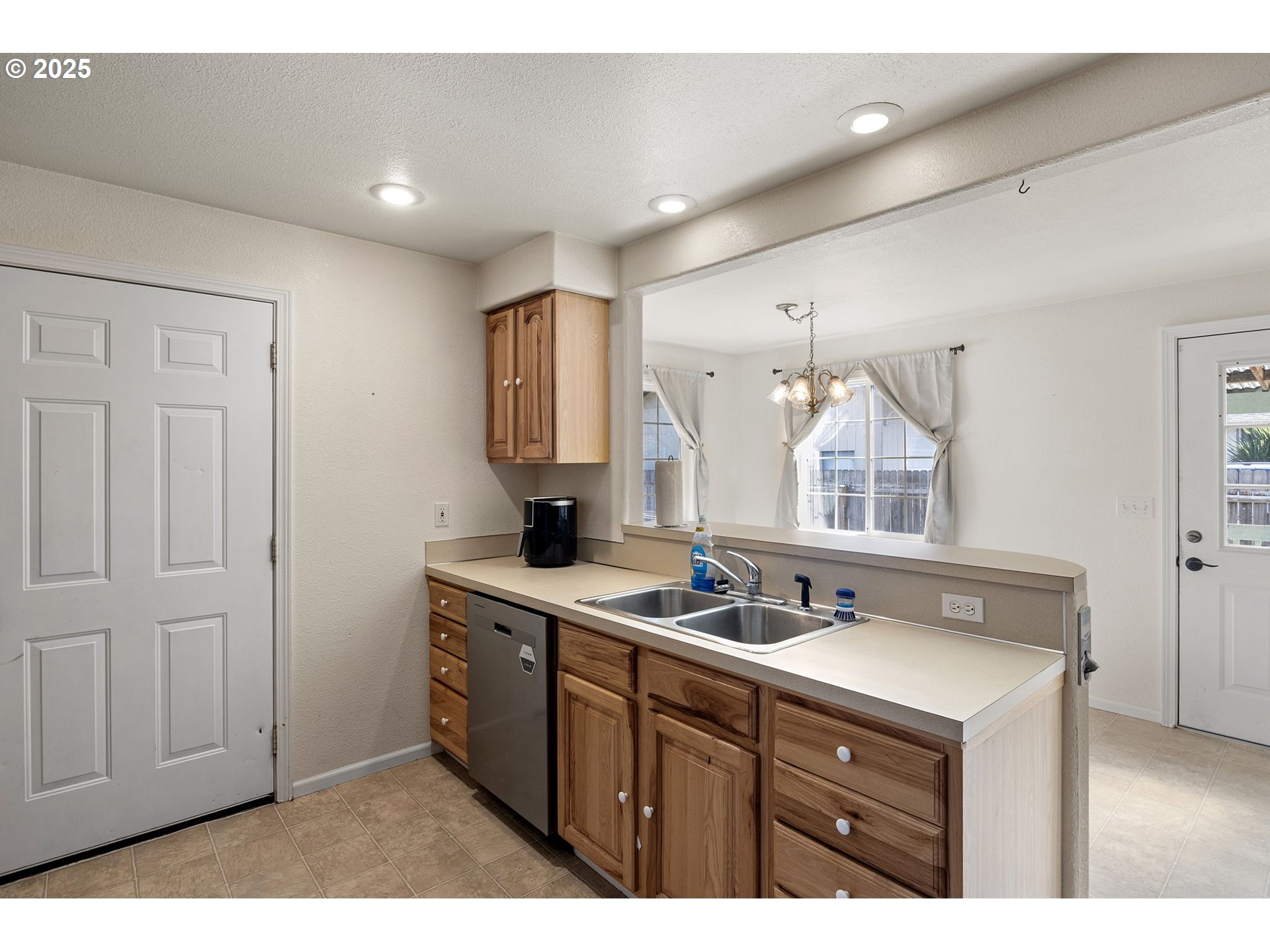 405 Lane Avenue Drain, OR 97435 - Photo 23 of 47 a kitchen with a sink cabinets and window