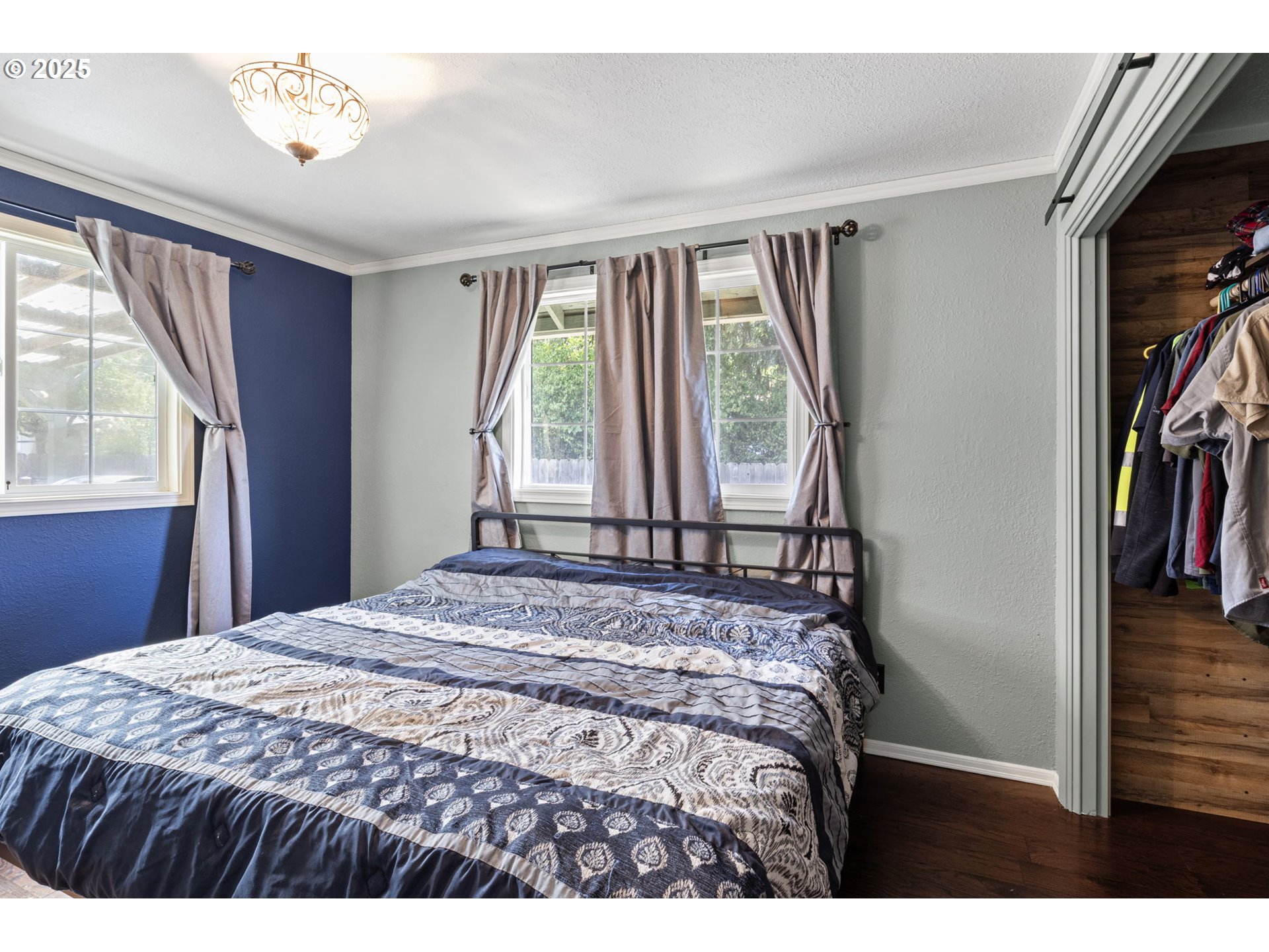 405 Lane Avenue Drain, OR 97435 - Photo 31 of 47 a bedroom with a bed next to a window