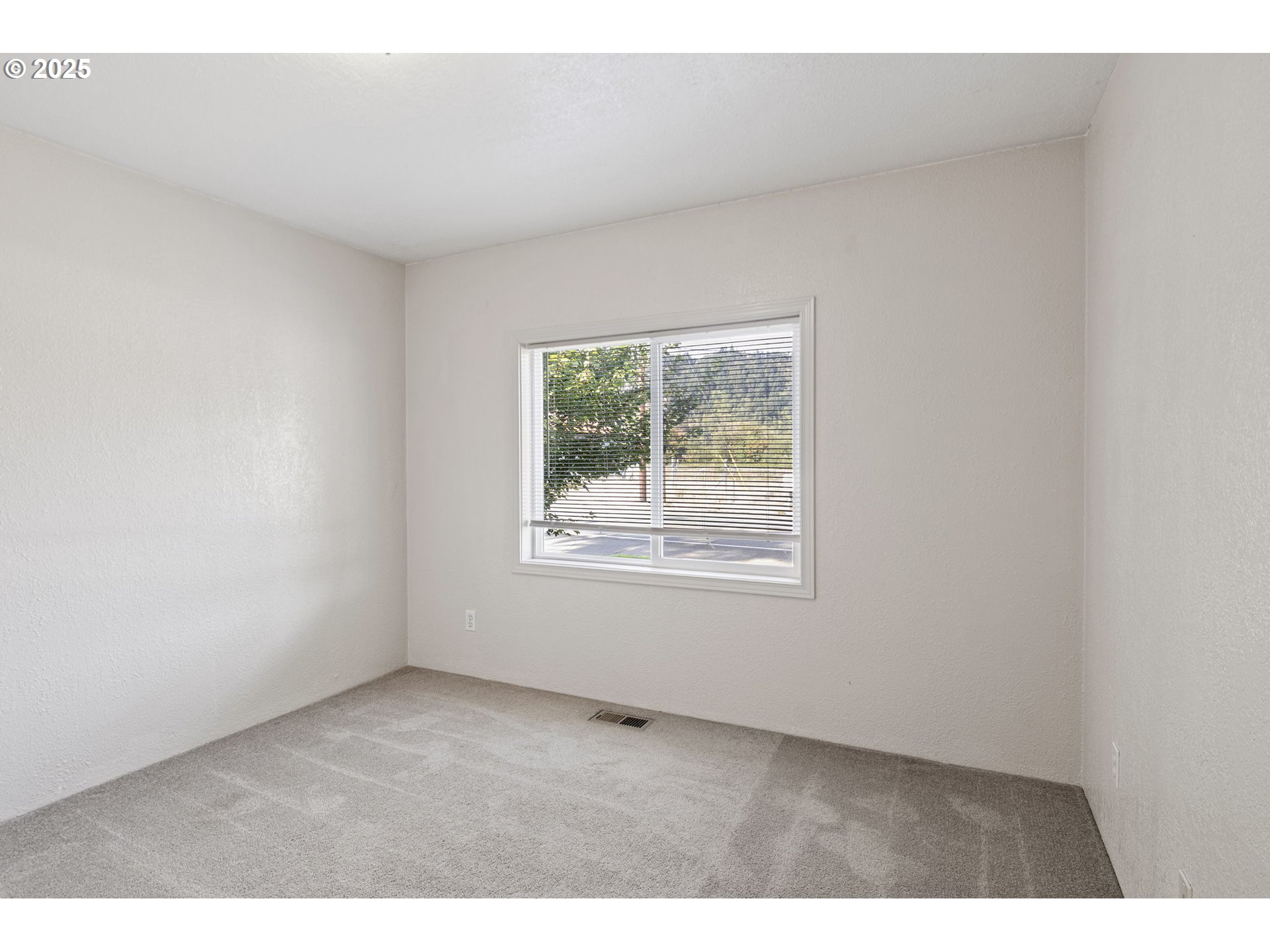 405 Lane Avenue Drain, OR 97435 - Photo 33 of 47 a view of an empty room with a window