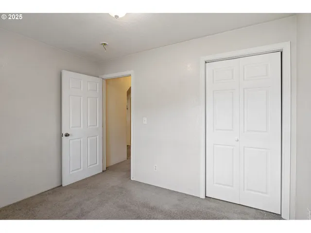 a bathroom with a sink vanity granite and a mirror