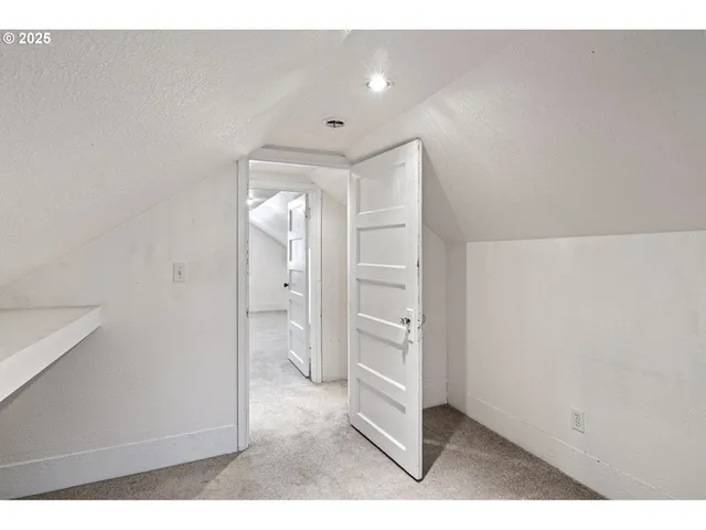 a view of a house with backyard and porch