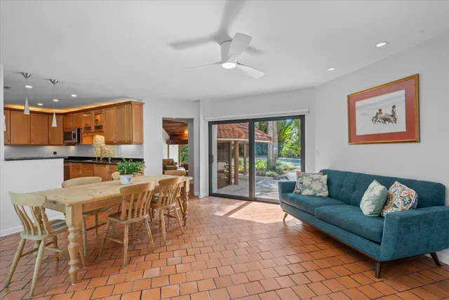 a kitchen with stainless steel appliances a stove a sink and a microwave