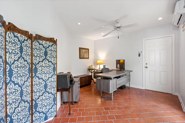 a view of a hallway with windows