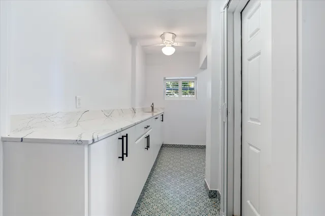 a view of house with swimming pool outdoor seating area and entertaining space