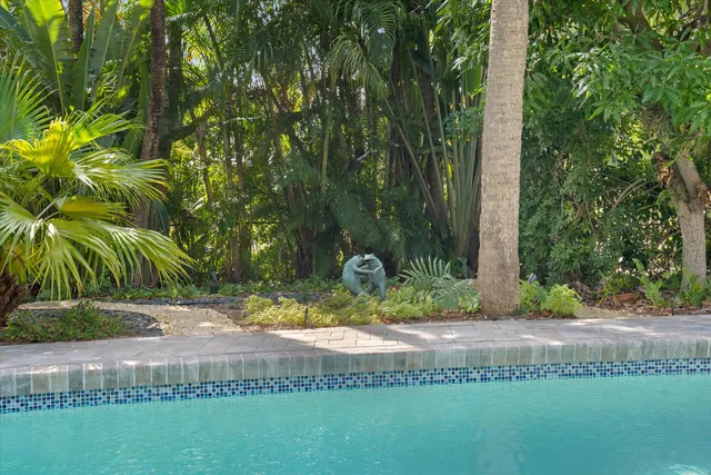 a view of a house with swimming pool