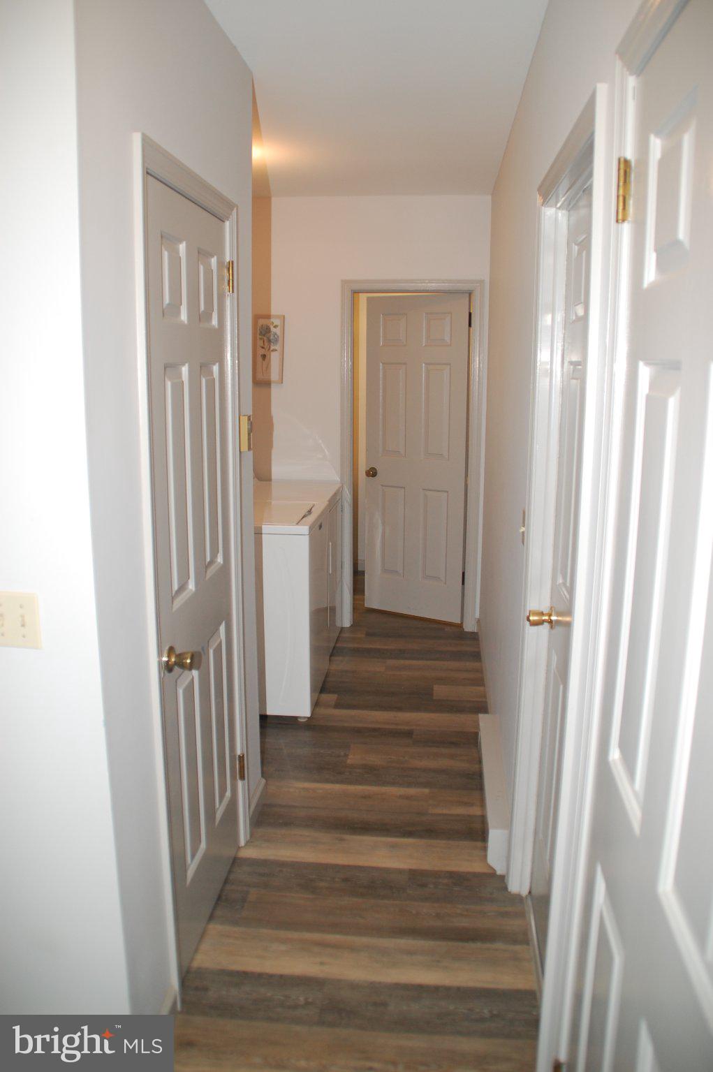 883 Kulp Road Harleysville, PA 19438 - Photo 12 of 54 Laundry provides coat closet and Garage access.