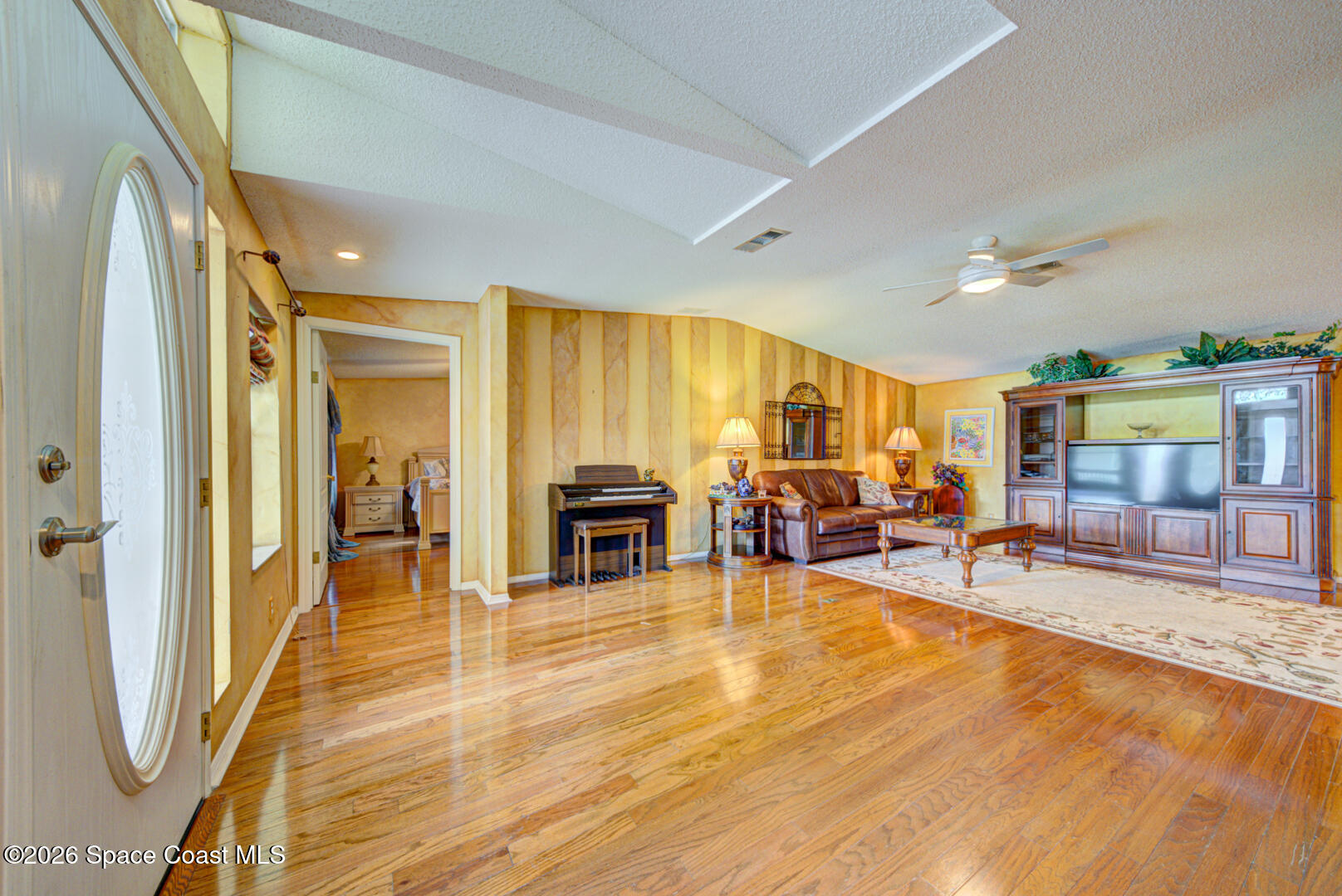 176 Woodsmill Boulevard, Unit 177 Cocoa, FL 32926 - Photo 26 of 63 24 foyer & living room