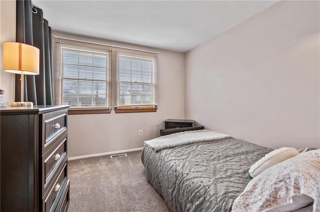 1885 George Circle Irwin, PA 15642 - Photo 16 of 25 a bedroom with a bed and a window