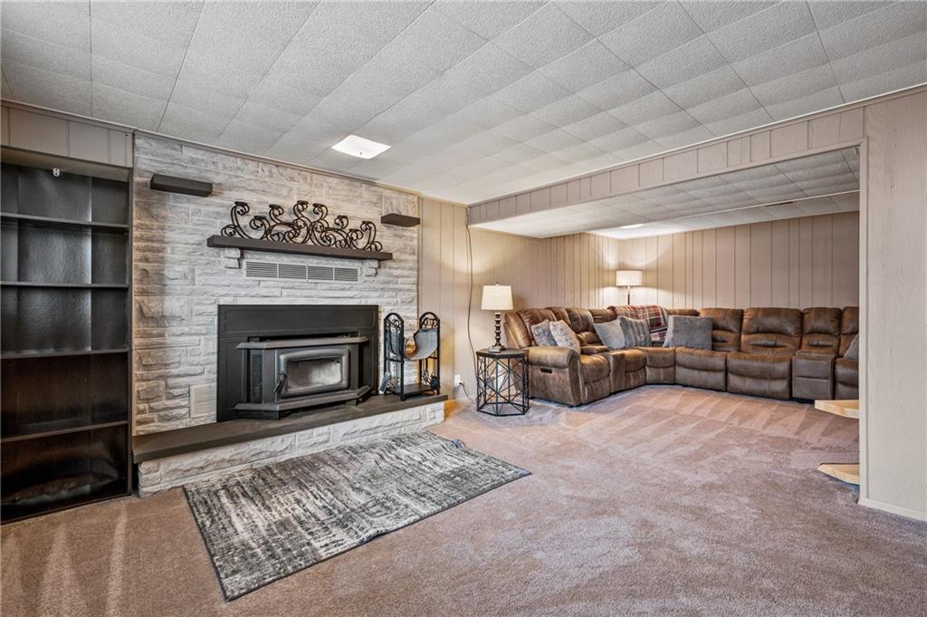 1885 George Circle Irwin, PA 15642 - Photo 19 of 25 a living room with furniture and a fireplace