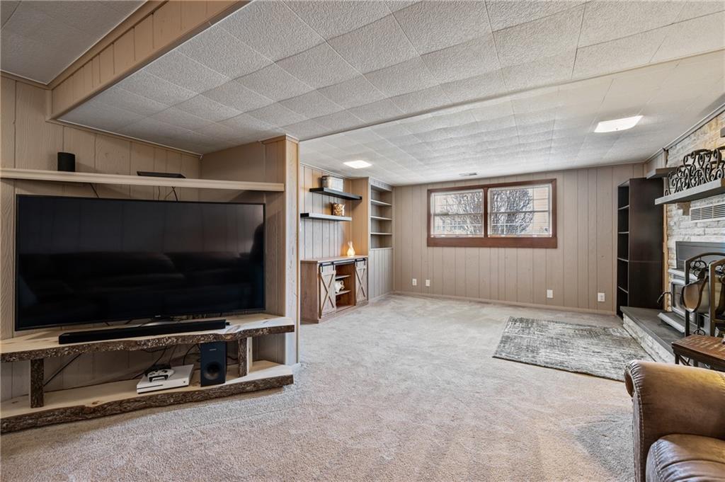 1885 George Circle Irwin, PA 15642 - Photo 21 of 25 a living room with furniture and a flat screen tv
