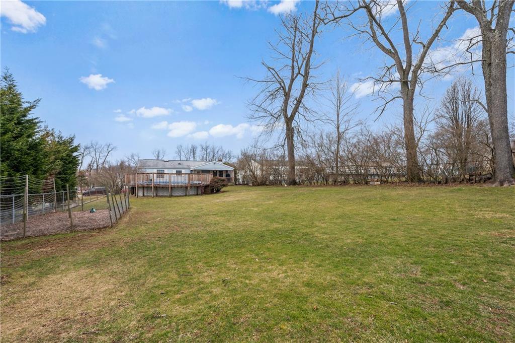 1885 George Circle Irwin, PA 15642 - Photo 25 of 25 a view of a yard with swimming pool and trees