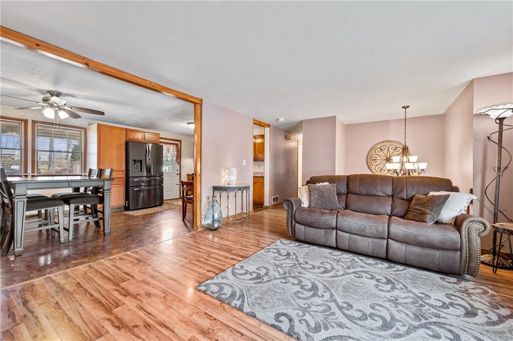 1885 George Circle Irwin, PA 15642 - Photo 4 of 25 a living room with furniture and a wooden floor