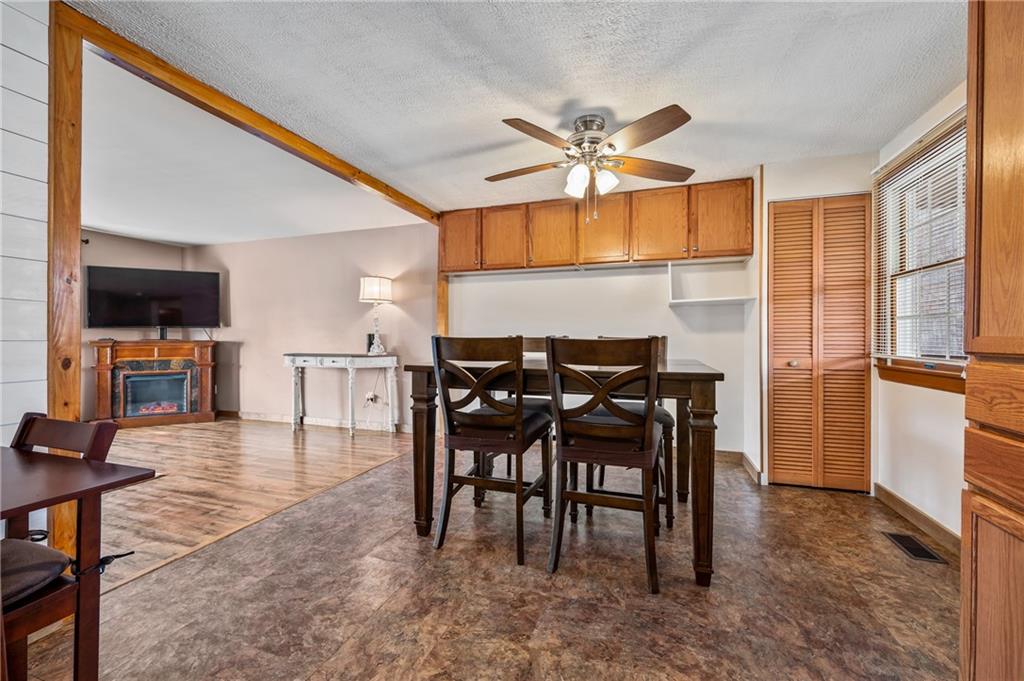 1885 George Circle Irwin, PA 15642 - Photo 5 of 25 a view of a a dining room with furniture window and wooden floor