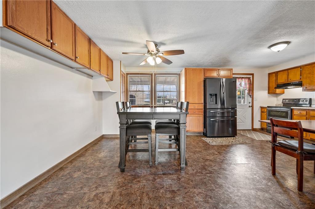 1885 George Circle Irwin, PA 15642 - Photo 6 of 25 a dining room with furniture and window