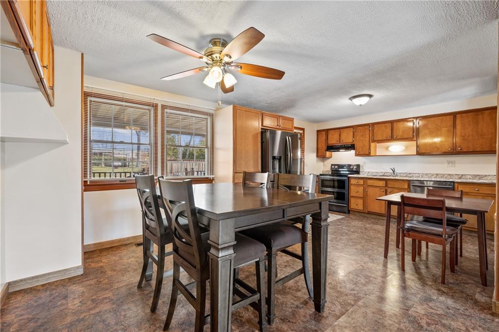 1885 George Circle Irwin, PA 15642 - Photo 7 of 25 a view of a dining room with furniture window and outside view
