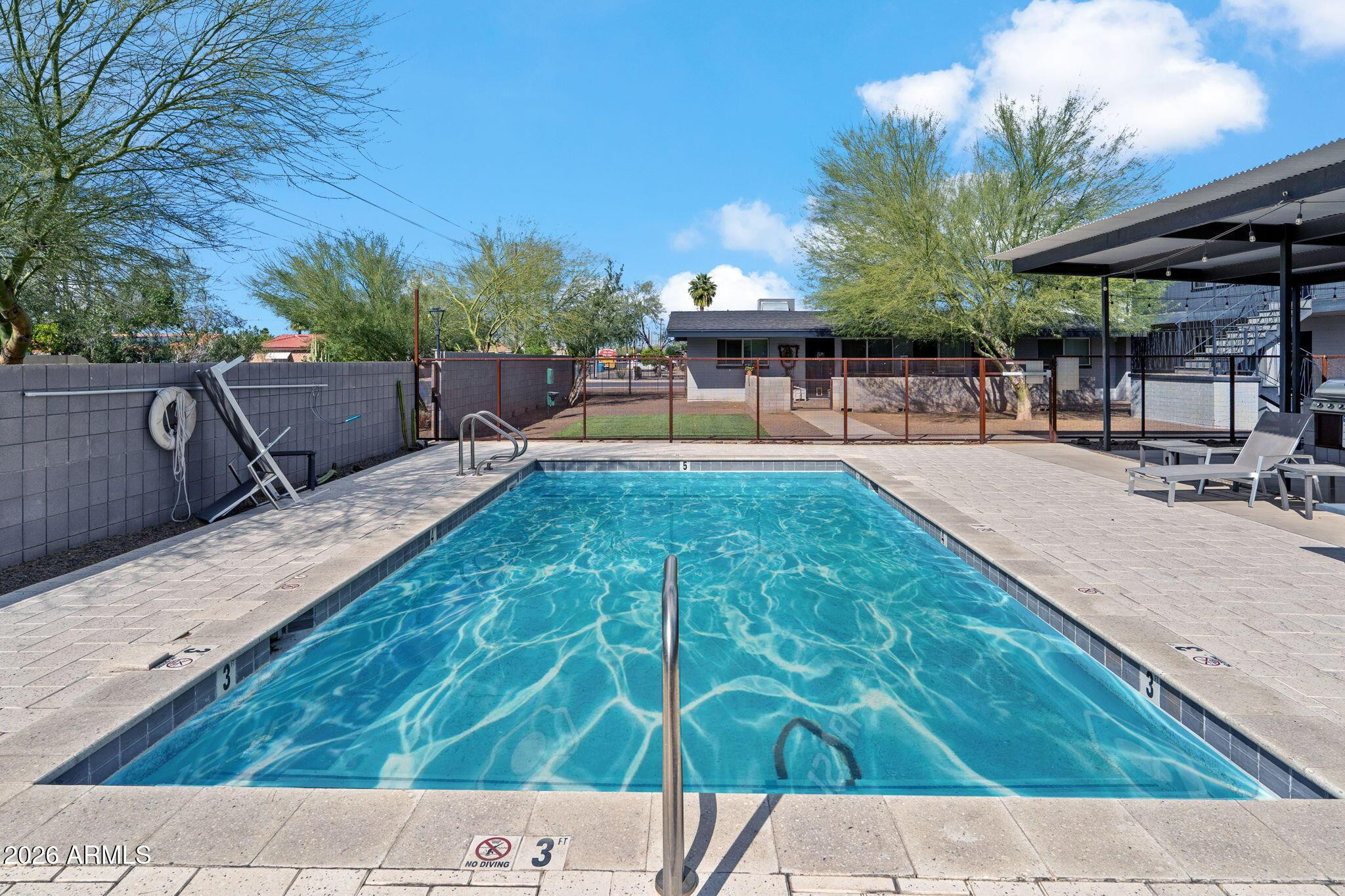 1707 North 18th Street, Unit B7 Phoenix, AZ 85006 - Photo 14 of 14 a view of a backyard with sitting area