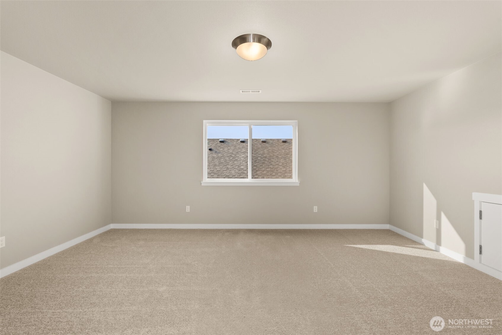 715 Maggee Street Southeast Lacey, WA 98513 - Photo 23 of 35 an empty room with windows