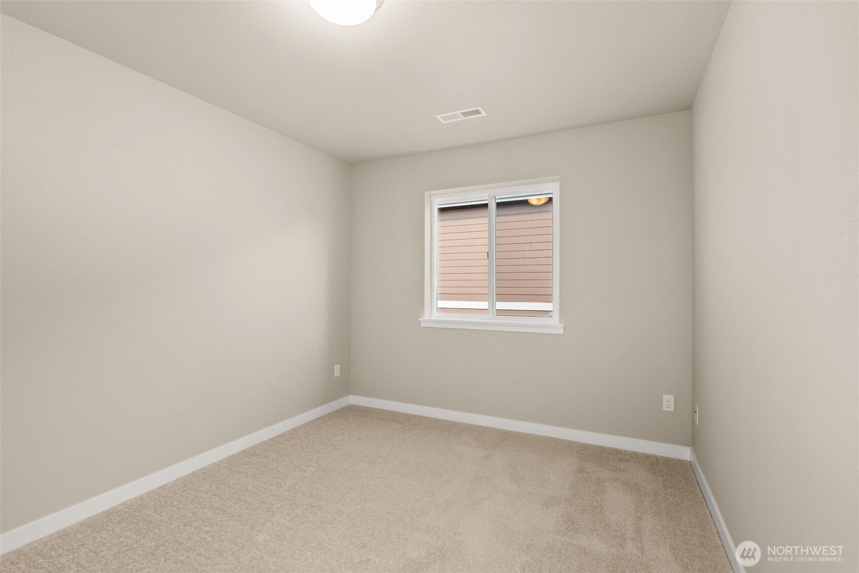 715 Maggee Street Southeast Lacey, WA 98513 - Photo 25 of 35 an empty room with a window