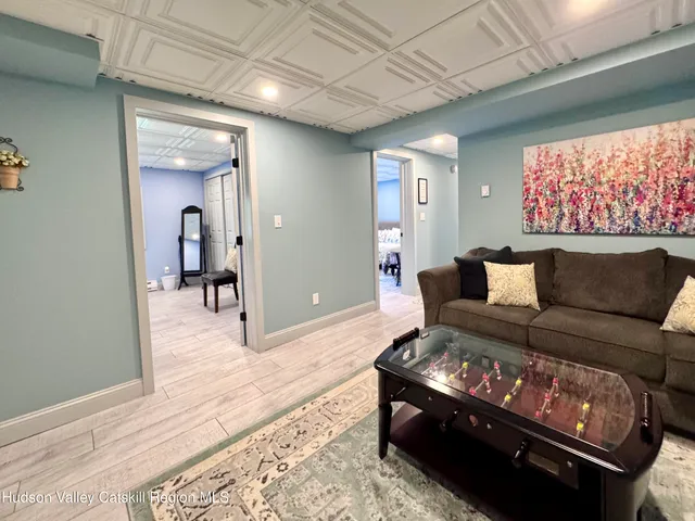 a bedroom with bed and a window