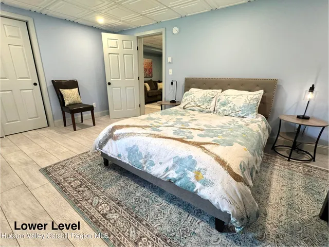 a bathroom with a sink a mirror and vanity