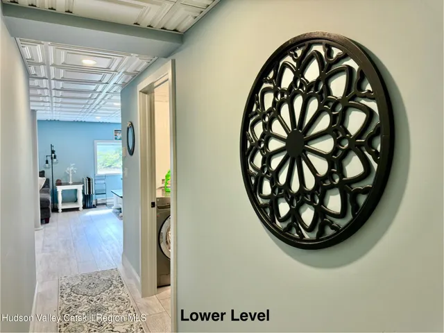 a bedroom with two beds and a window