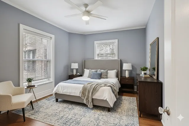 a bedroom with a bed and a couch