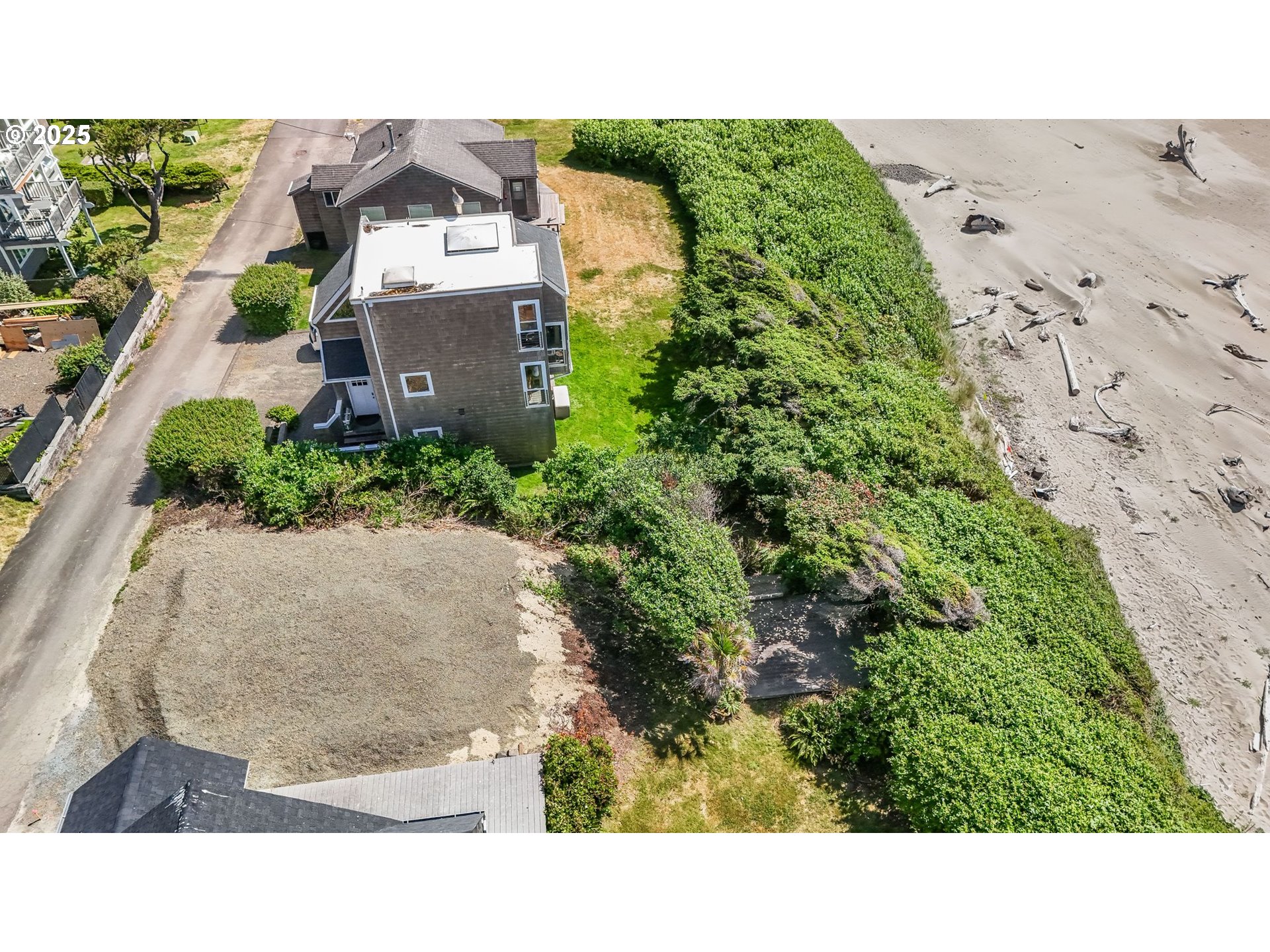Ocean Avenue Cannon Beach, OR 97110 - Photo 12 of 12 an aerial view of a house