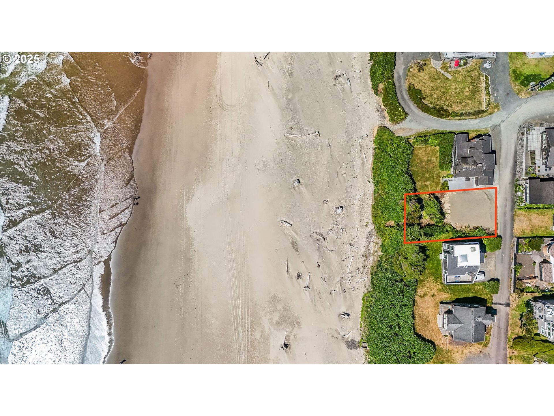 Ocean Avenue Cannon Beach, OR 97110 - Photo 3 of 12 a black and white photo of a house