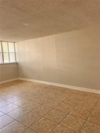 en empty room with windows