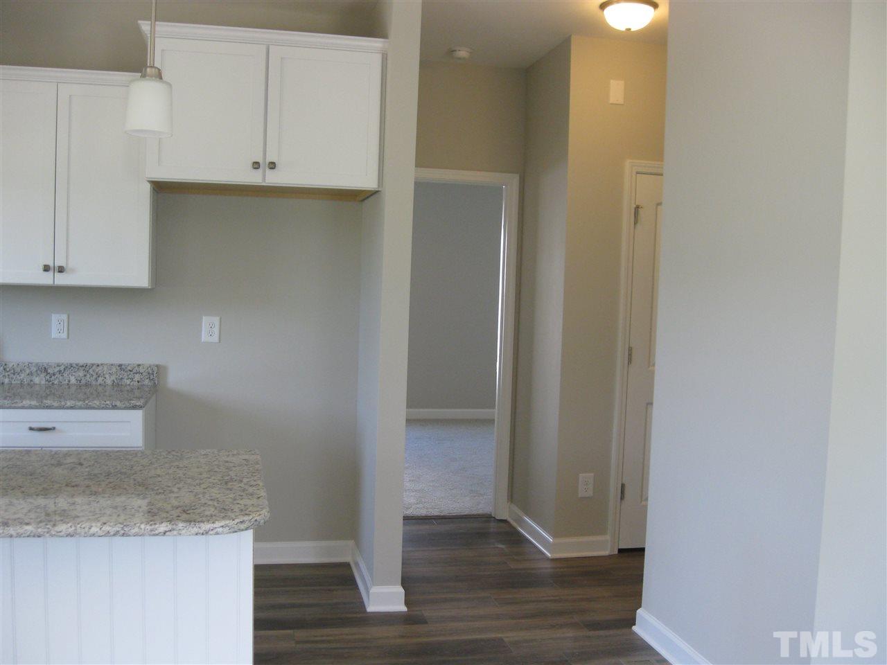 From the Kitchen, take the hallway to your MAIN LEVEL MASTER SUITE!