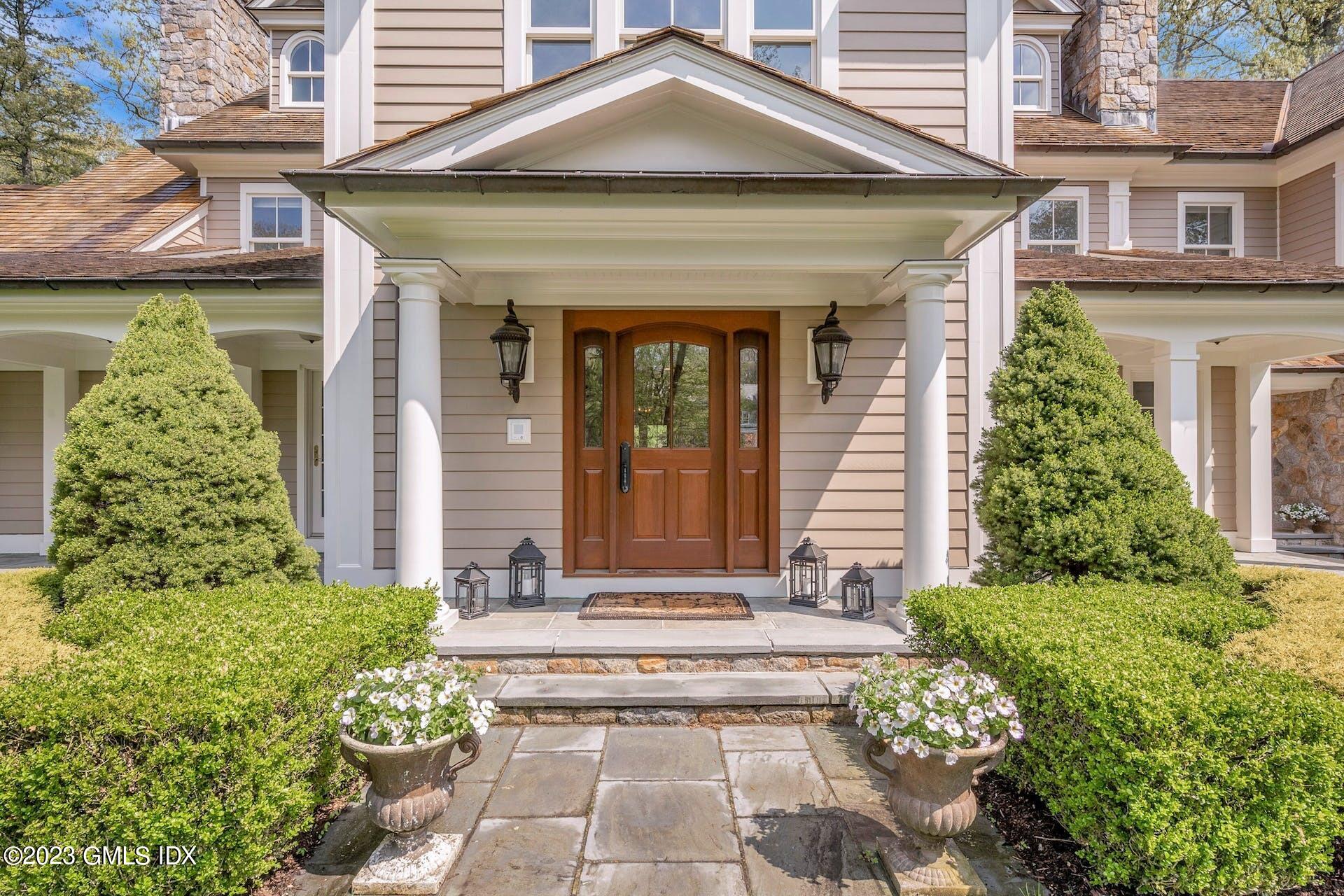 53 Hillside Road Greenwich, CT 06830 - Photo 2 of 37 a front view of a house