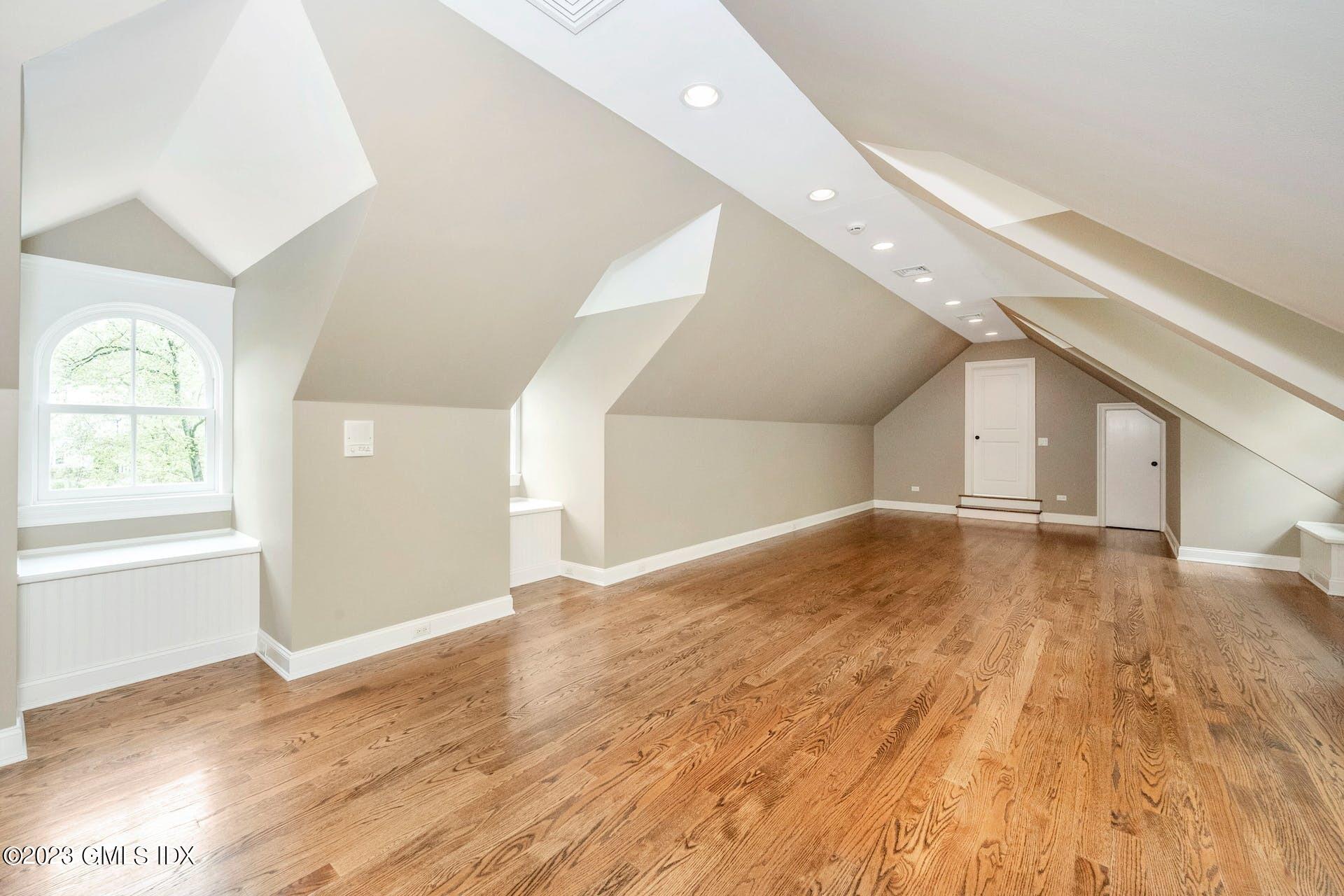 53 Hillside Road Greenwich, CT 06830 - Photo 23 of 37 a view of empty room with wooden floor