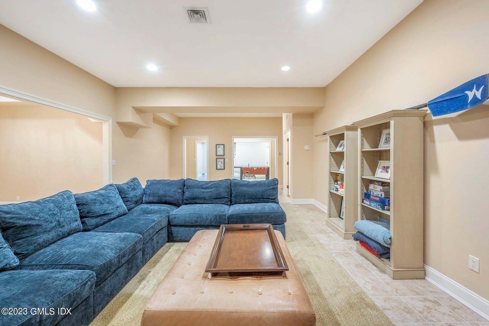 53 Hillside Road Greenwich, CT 06830 - Photo 25 of 37 a living room with furniture and a couch