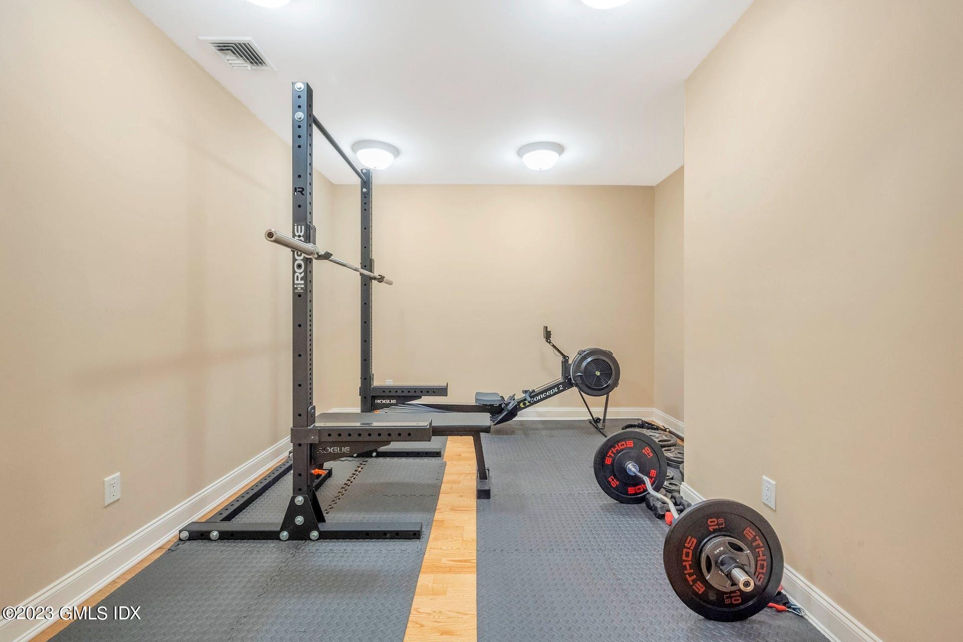53 Hillside Road Greenwich, CT 06830 - Photo 27 of 37 a view of a room with gym equipment