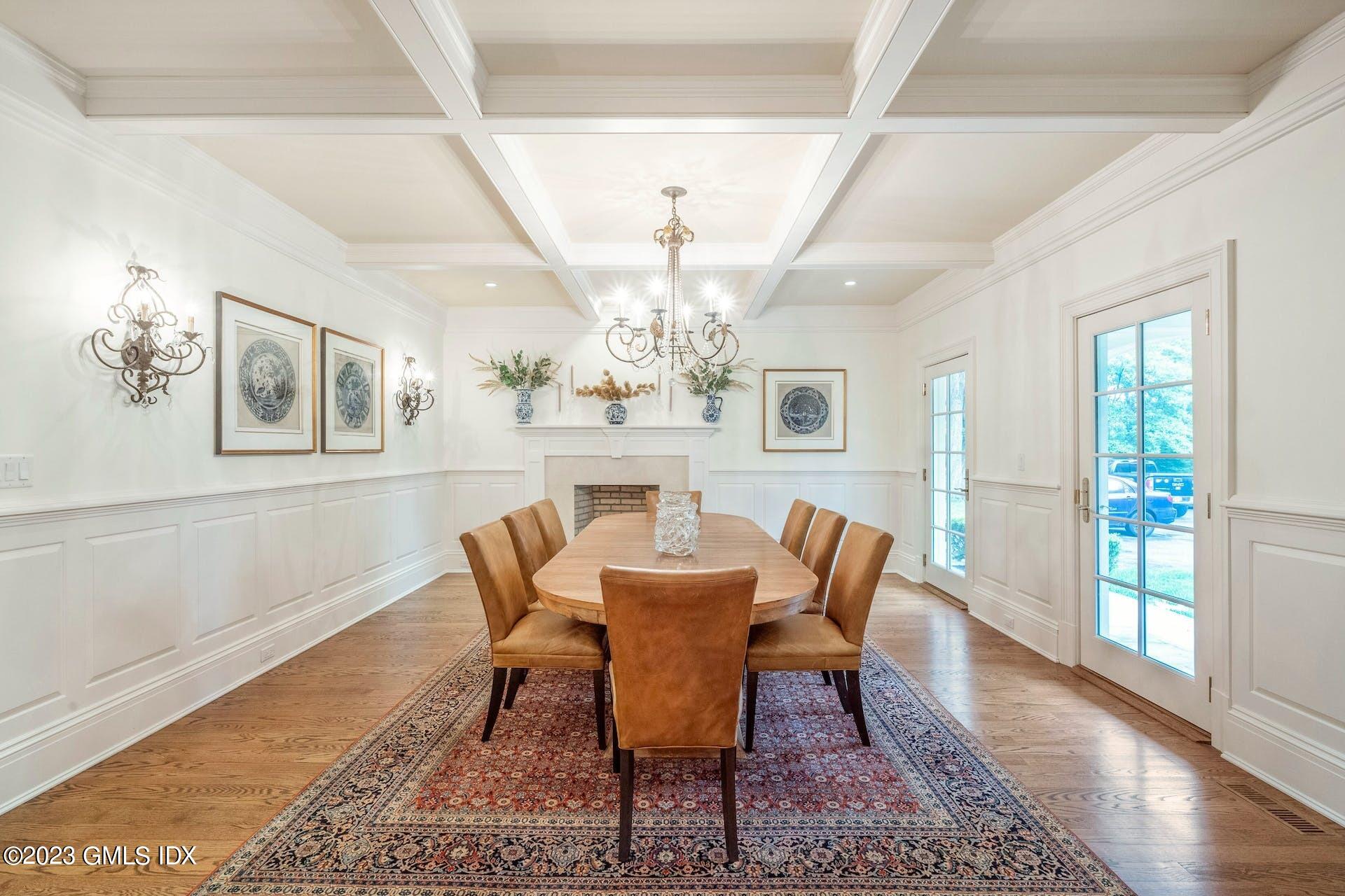 53 Hillside Road Greenwich, CT 06830 - Photo 5 of 37 a view of a dining room with furniture wooden floor and chandelier