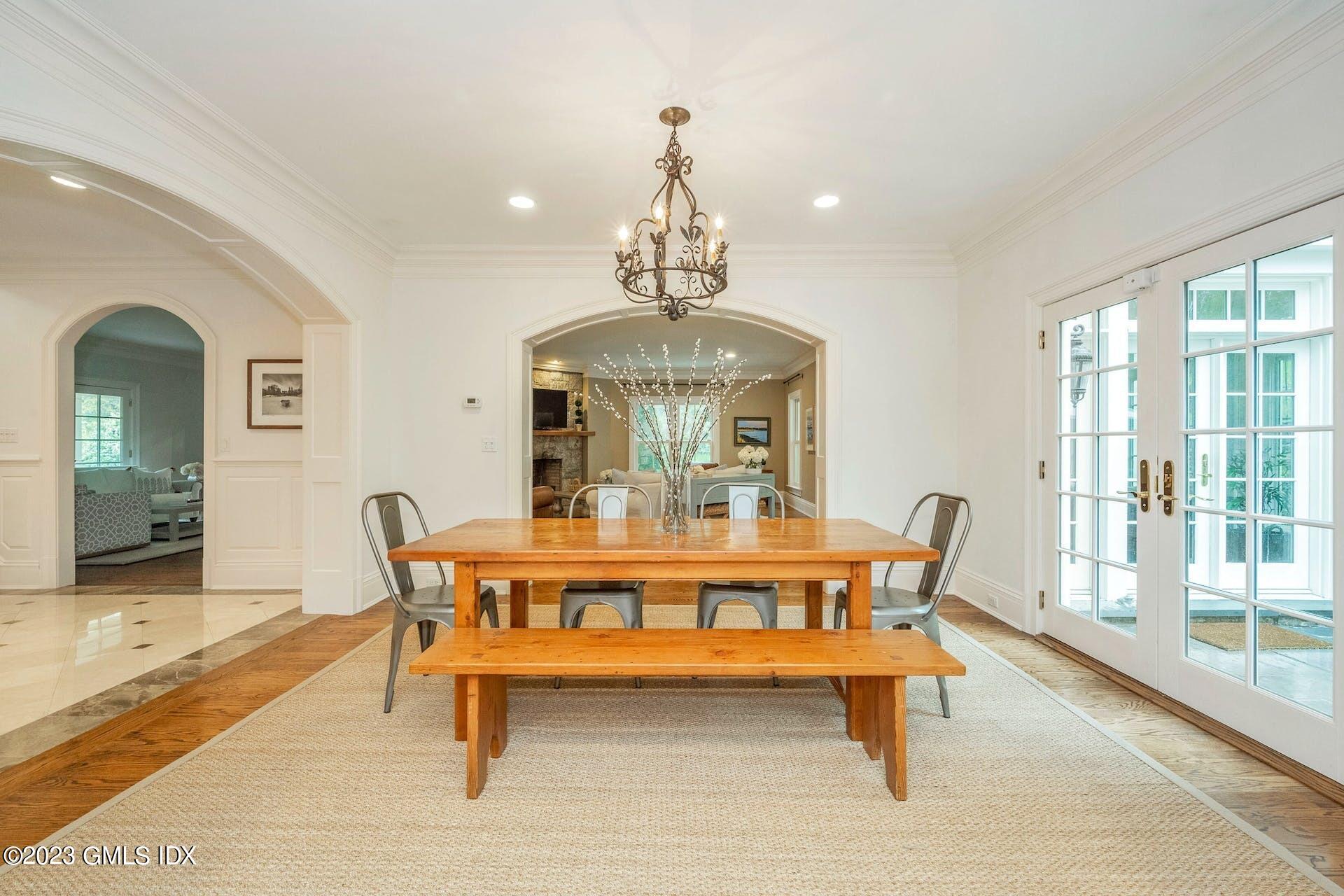 53 Hillside Road Greenwich, CT 06830 - Photo 9 of 37 a view of a dining room with furniture window and wooden floor