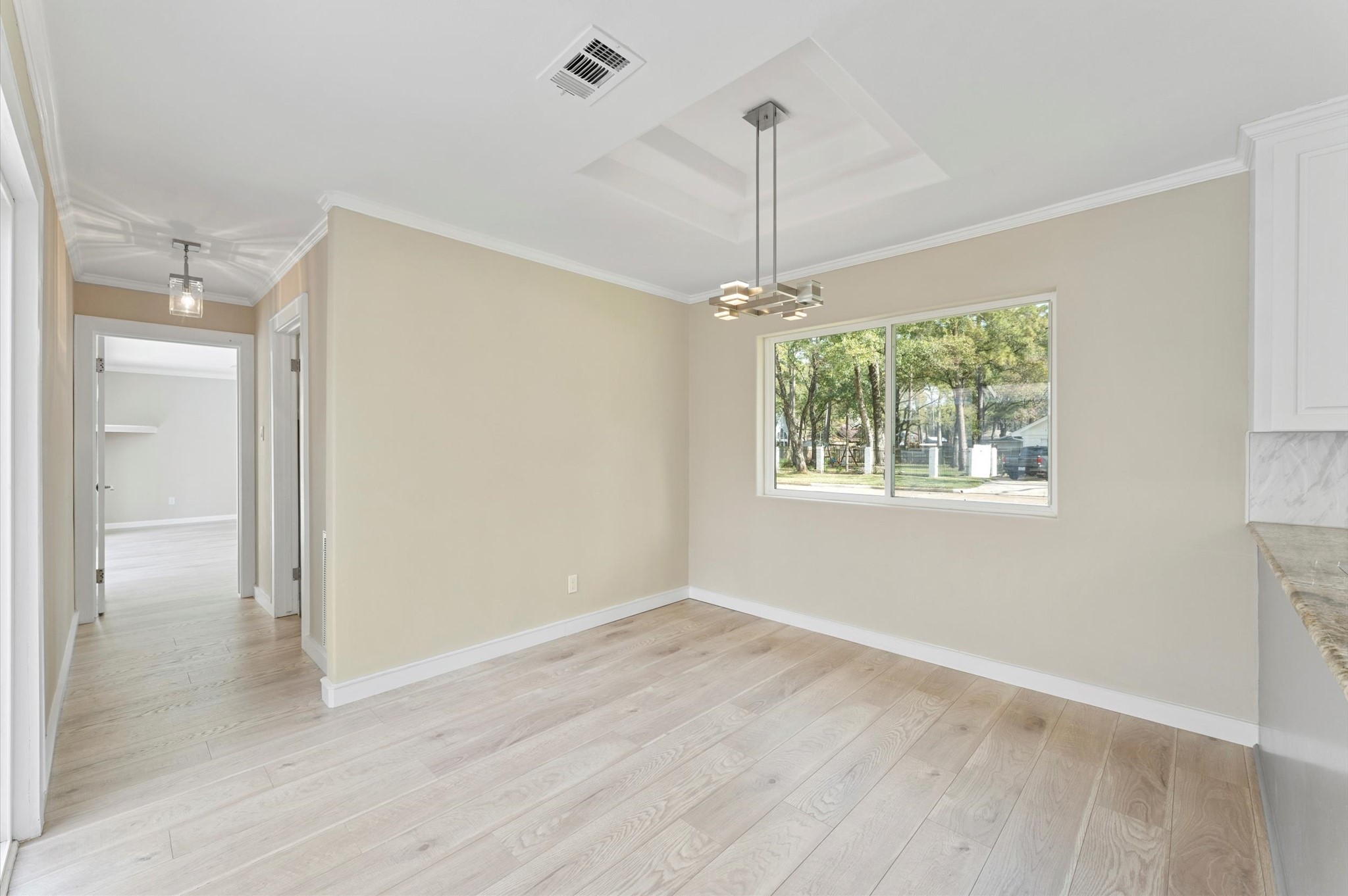 6402 Fawnwood Drive Spring, TX 77389 - Photo 11 of 50 Breakfast room and hall leading to laundry room and Primary bedroom 1