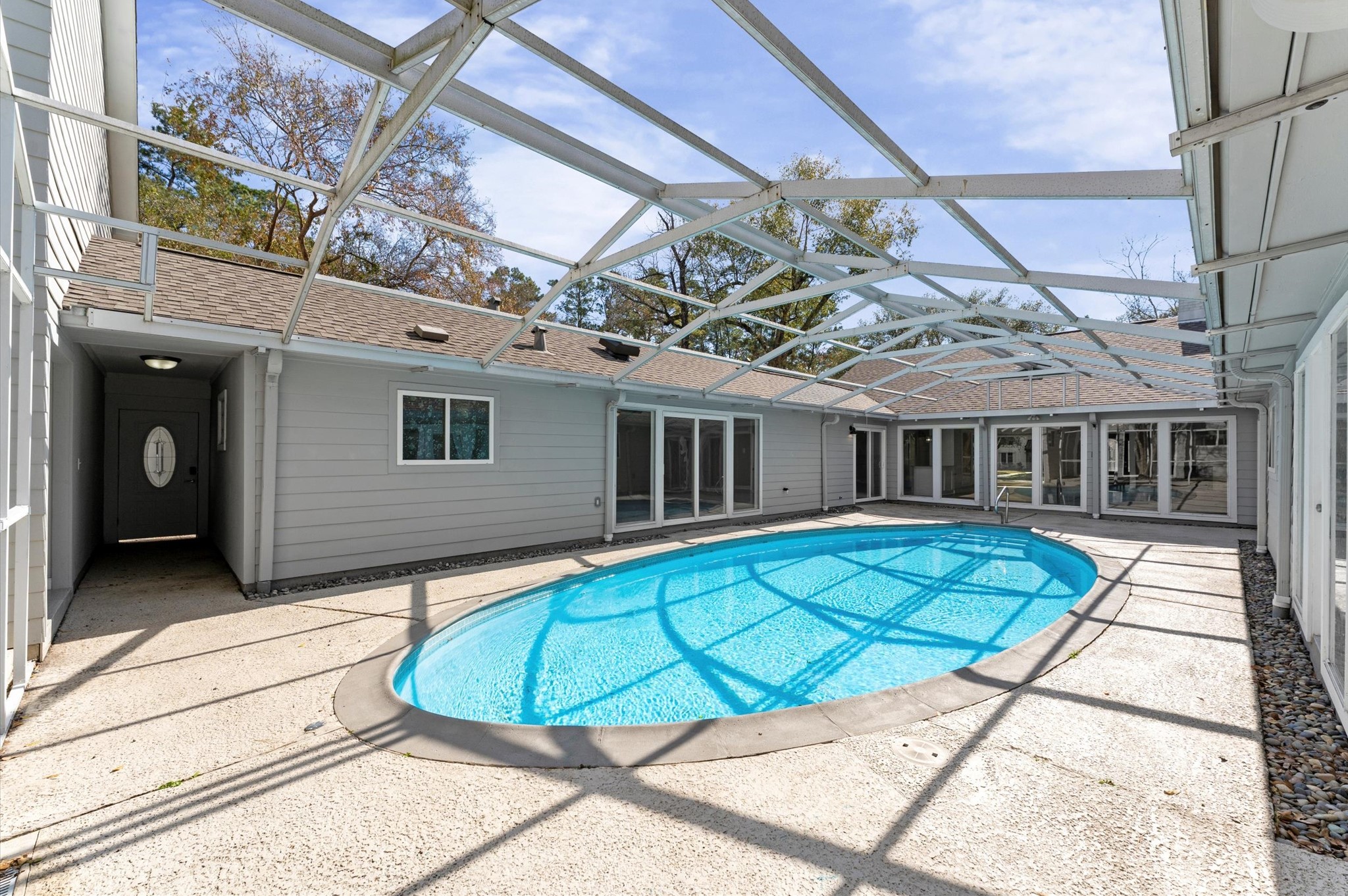 6402 Fawnwood Drive Spring, TX 77389 - Photo 46 of 50 Pool with new pump and framing to add screens
