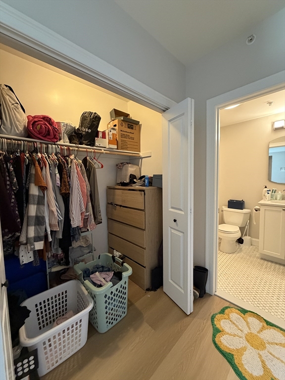 43 Pitman Street, Unit 302 Somerville, MA 02143 - Photo 12 of 14 a view of a living room and a couch