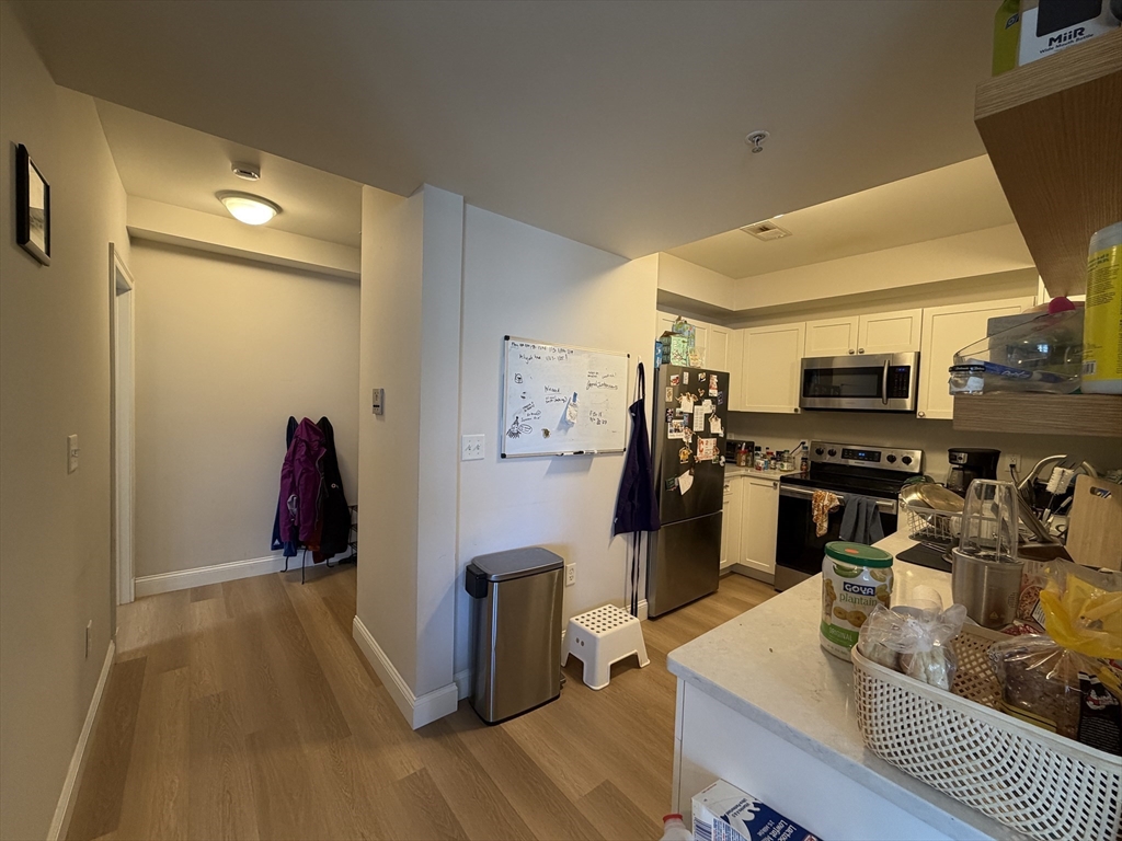 43 Pitman Street, Unit 302 Somerville, MA 02143 - Photo 4 of 14 a very nice looking room with a large window