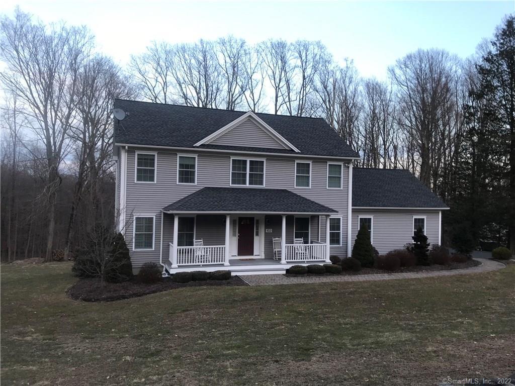 102 Wheeler Road Monroe, CT 06468 - Photo 1 of 1 a front view of a house with a garden