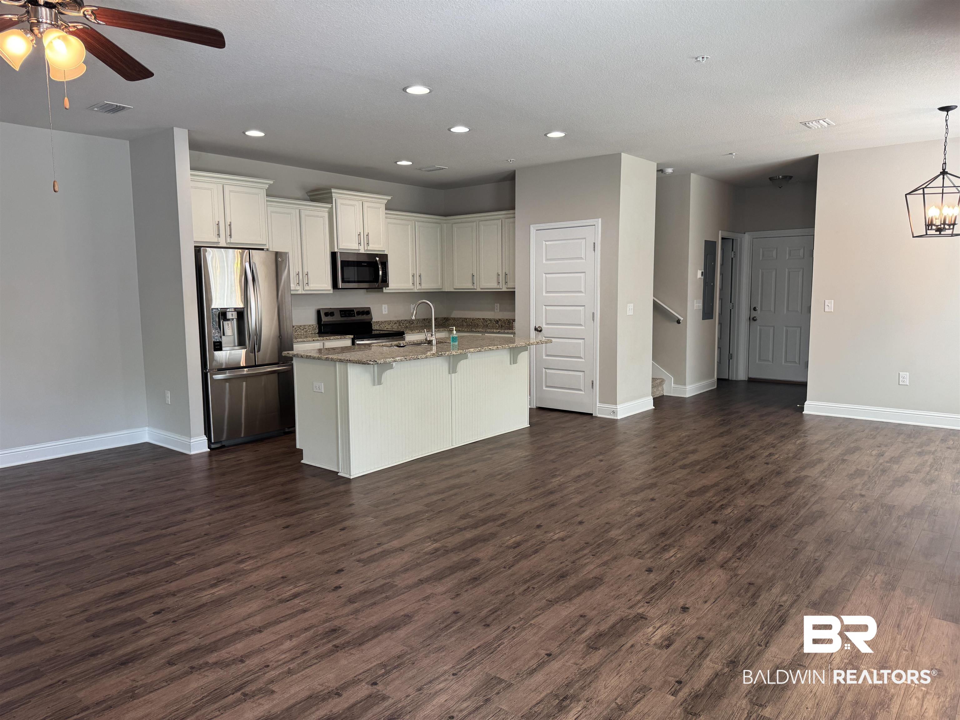 6811 Spaniel Drive, Unit C Daphne, AL 36527 - Photo 31 of 33 Kitchen with stainless steel appliances, recessed lighting, baseboards, a ceiling fan, and open floor plan